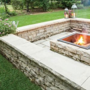 Dimensional Fire Pit Kit stone in backyard